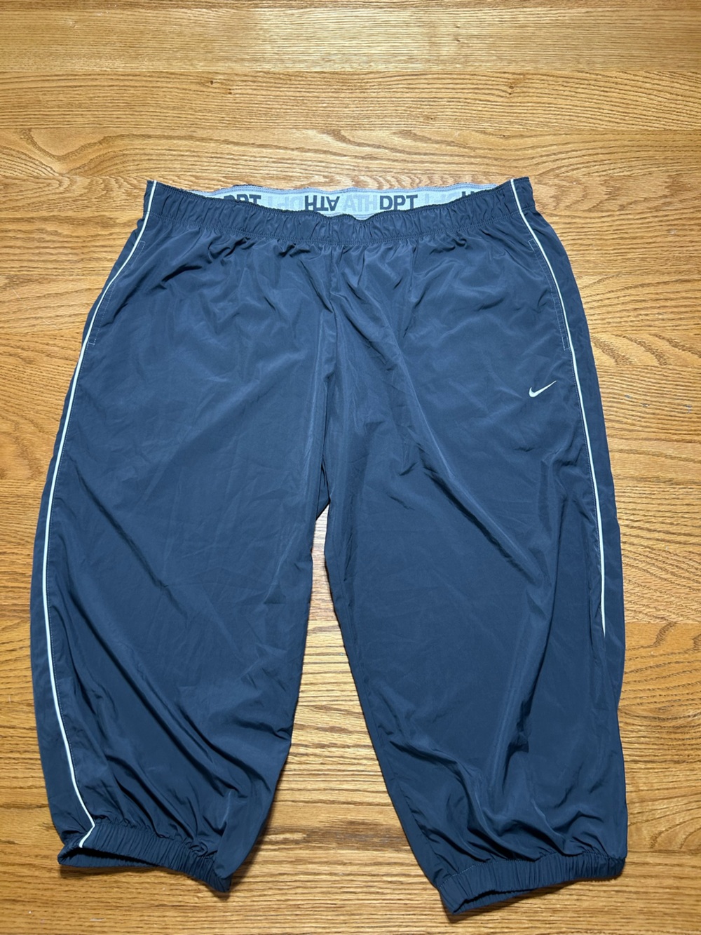 Women’s Nike the athletic dept Track Capris Grey with White Size XL